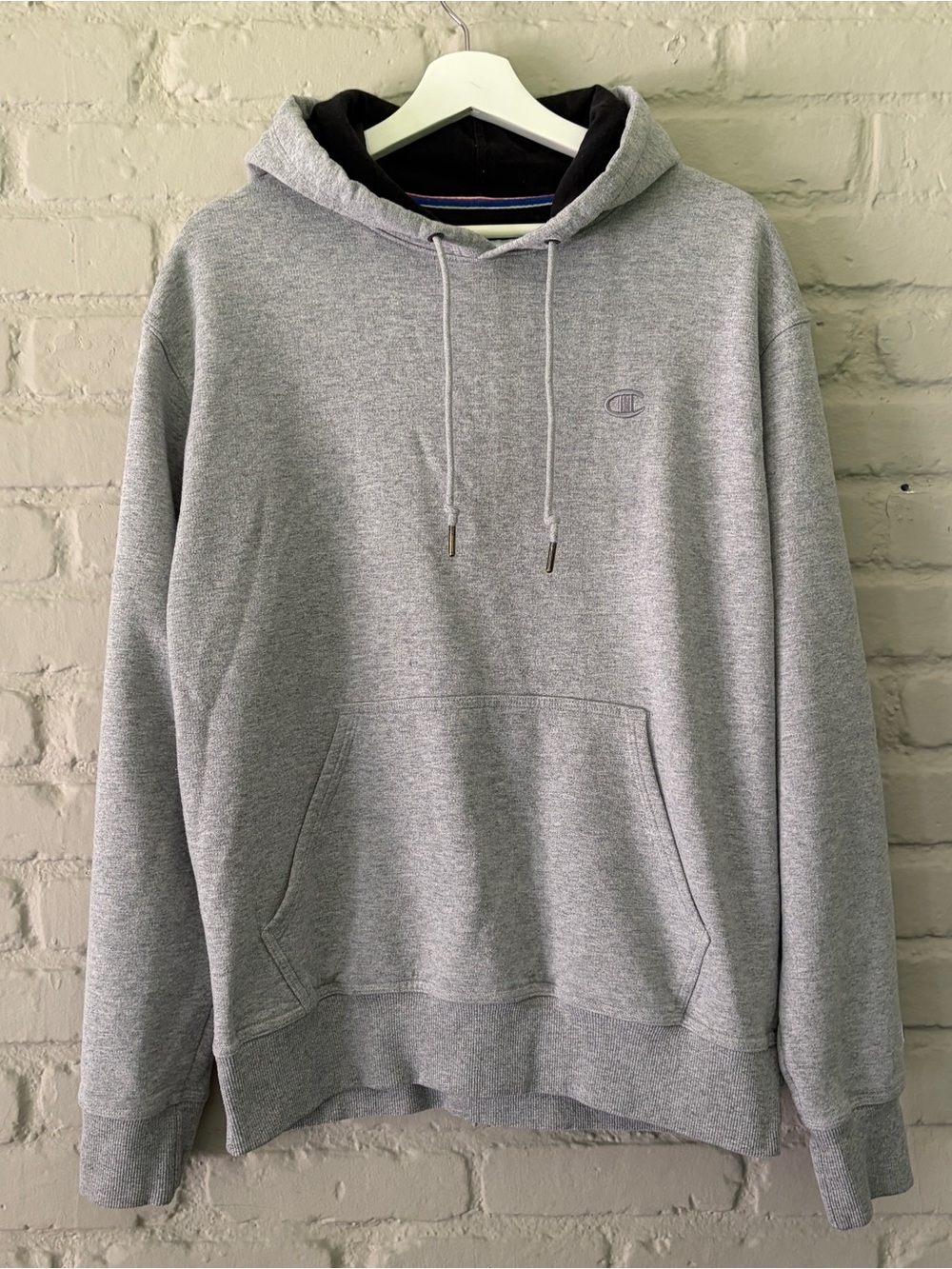 Champion Light Gray Pullover Hoodie with Subtle Logo